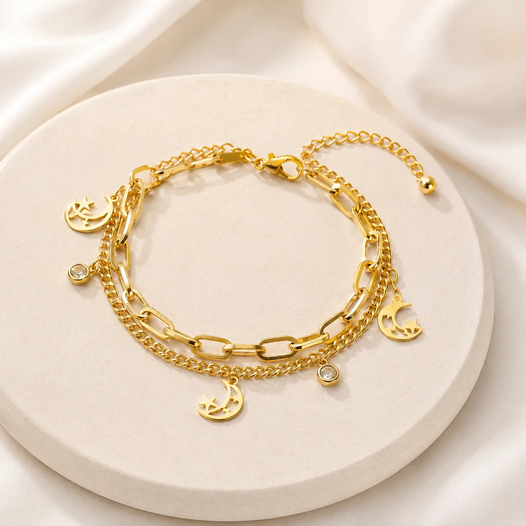 Gold layered moon and star charm bracelet for women
