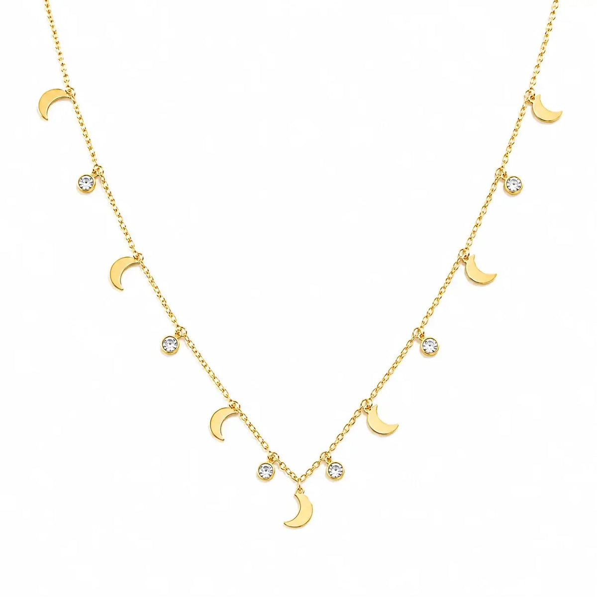 A delicate gold necklace featuring a series of small moon phases and clear round gemstones on a clean white background.