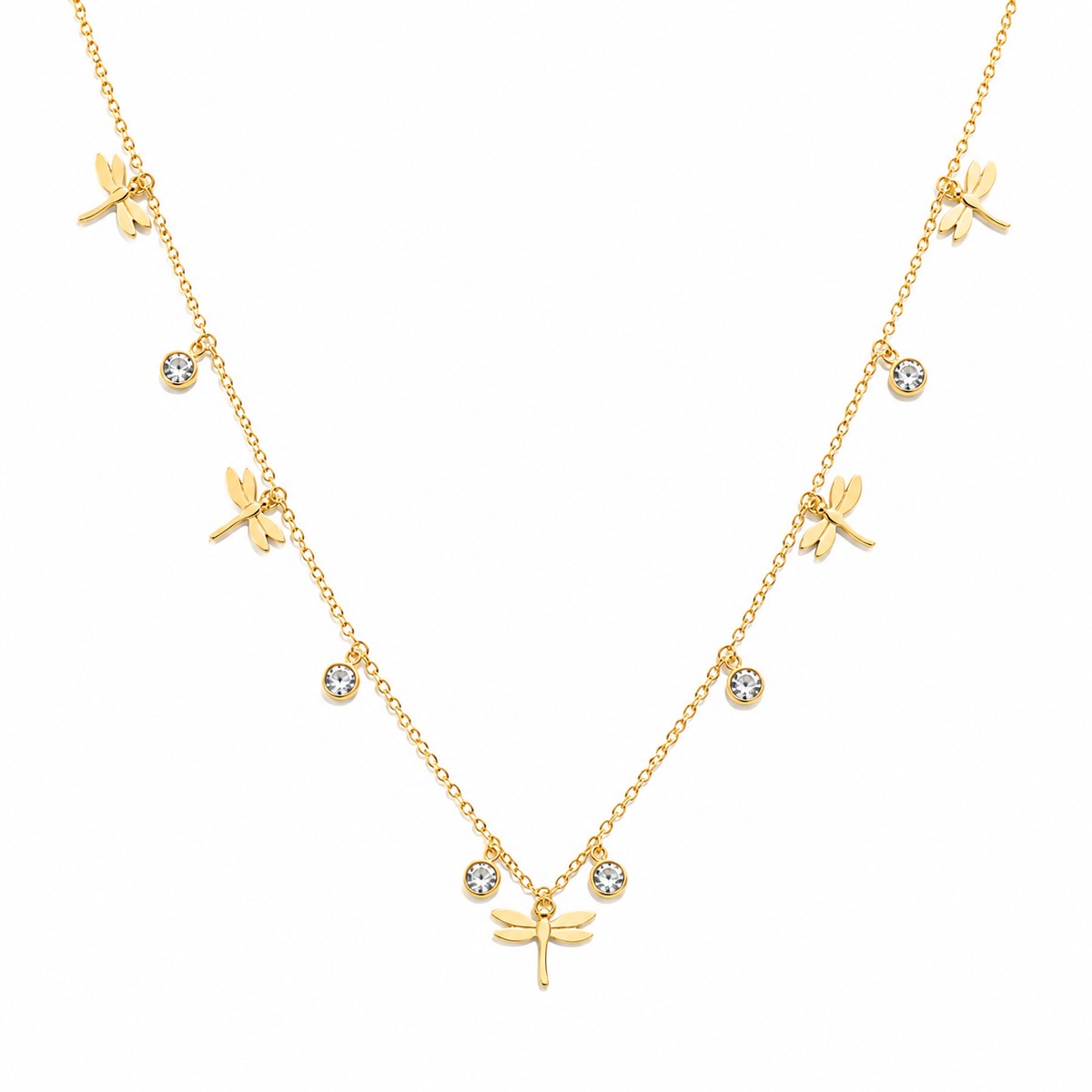 A delicate gold necklace featuring multiple dragonfly charms and small round bezel-set clear stones, displayed on a clean white background.