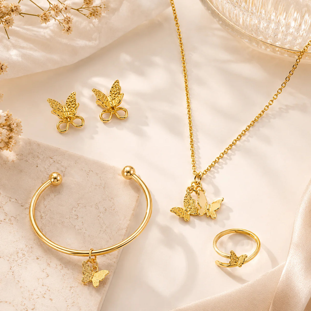 Golden butterfly wings 4-piece jewelry set with necklace earrings bracelet and ring