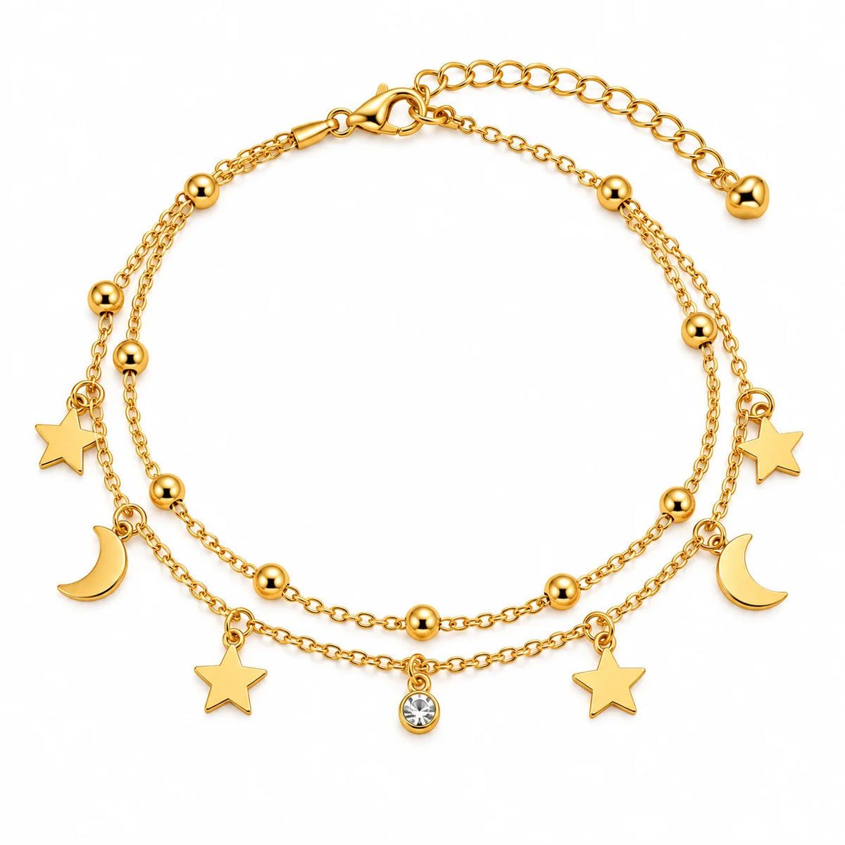 A double-layered gold chain anklet featuring star and crescent moon charms, polished gold beads, and a central clear rhinestone charm, displayed on a clean white background.